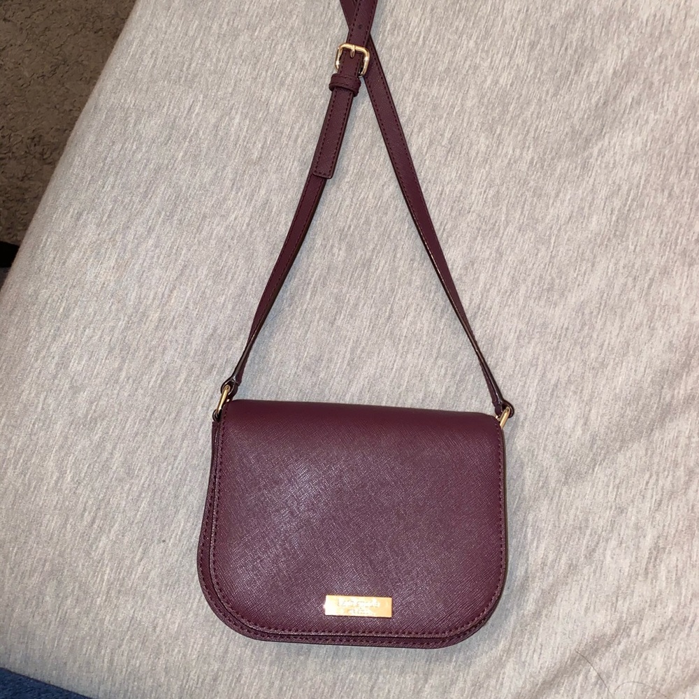 Maroon Kate spade cross body purse front clasp